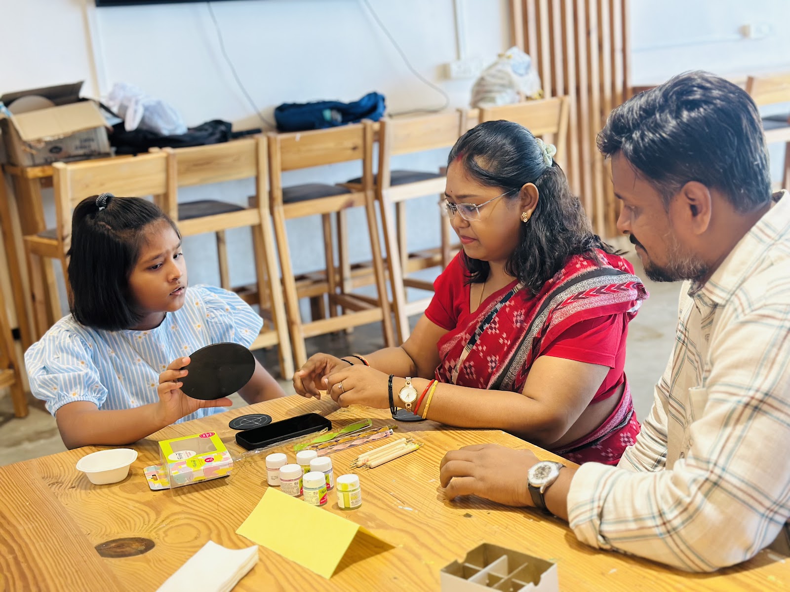 Parents and students creating together during the final showcase